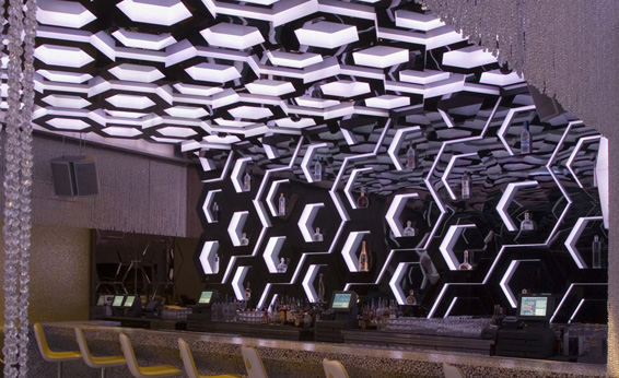oon Nightclub Side View of Hexagons in Bar